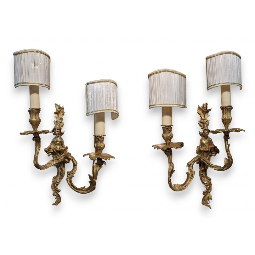 A pair of ‘Chinese-style’ wall sconces in gilded bronze