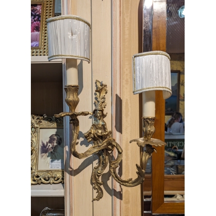 A pair of ‘Chinese-style’ wall sconces in gilded bronze