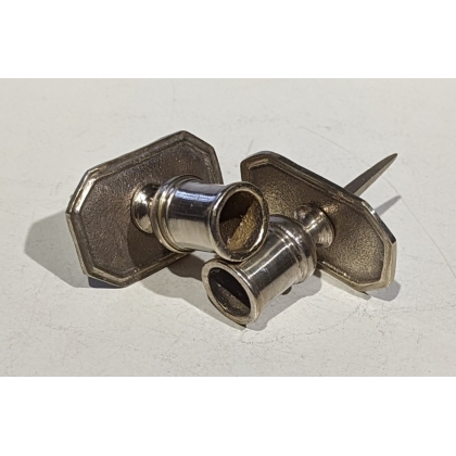 A pair of silver-plated bronze candlesticks by Tric-Trac