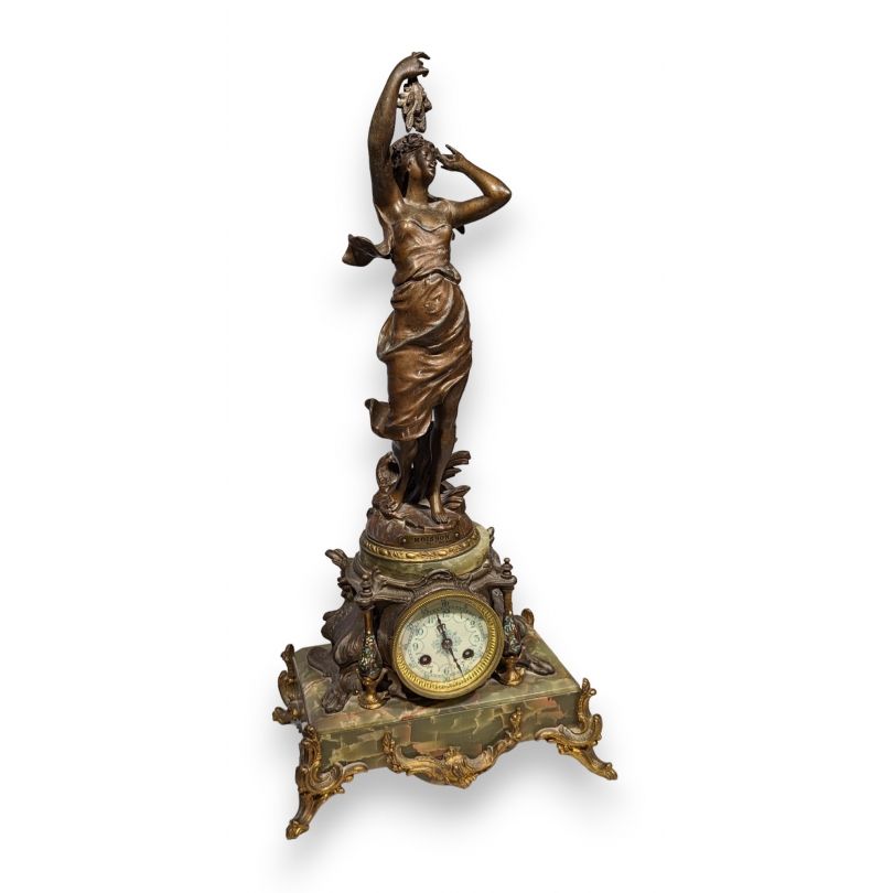 Onyx clock topped with ‘Moisson’