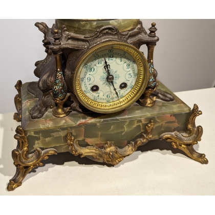 Onyx clock topped with ‘Moisson’