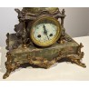 Onyx clock topped with ‘Moisson’