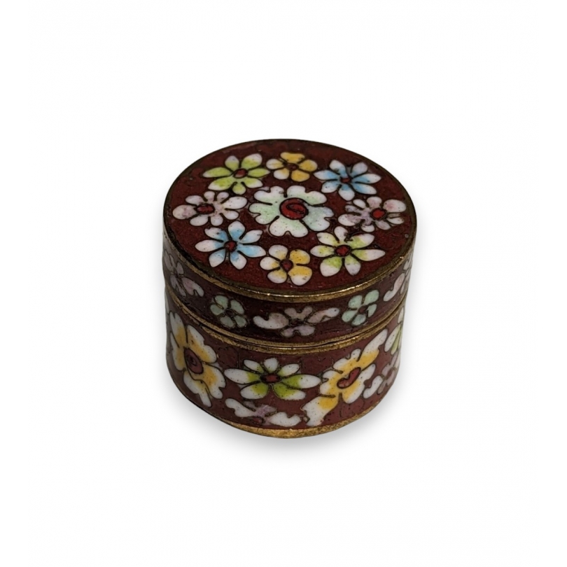Red round box with floral panels