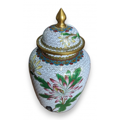 White cloisonné vase with flowers