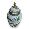White cloisonné vase with flowers