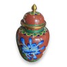 Red cloisonné vase with flowers