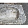 Stone sink with an oval opening