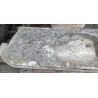 Stone sink with an oval opening