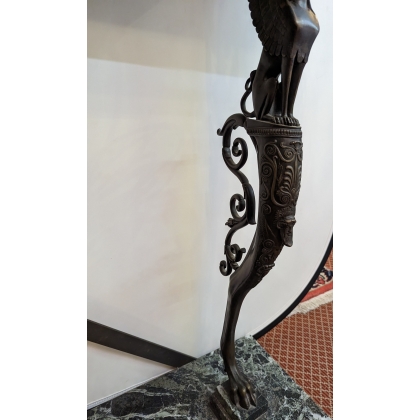 A pair of Neoclassical bronze side tables