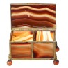 A box shaped like a casket, made of gold and orange metal