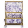 A box shaped like a casket, made of gold and purple metal