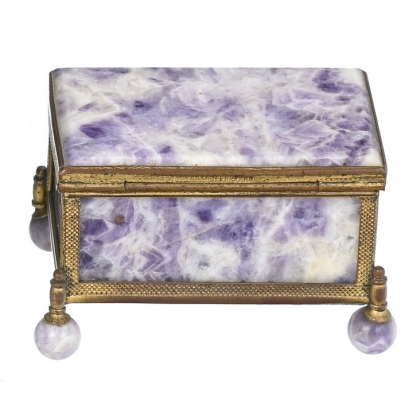 A box shaped like a casket, made of gold and purple metal