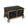 A box shaped like a casket, made of gold and blue metal