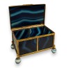 A box shaped like a casket, made of gold and blue metal