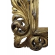 Miroir italien en bois richement sculpté et doré