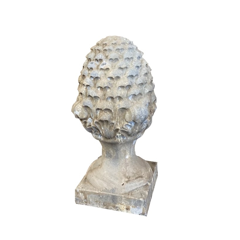 Carved stone pine cone