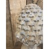 Carved stone pine cone