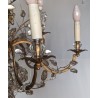 Lustre en fer doré et cristaux par Baguès