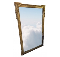 Grand miroir Napoléon III en stuc doré