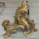 Paire de chenets Louis XV en bronze doré et fonte