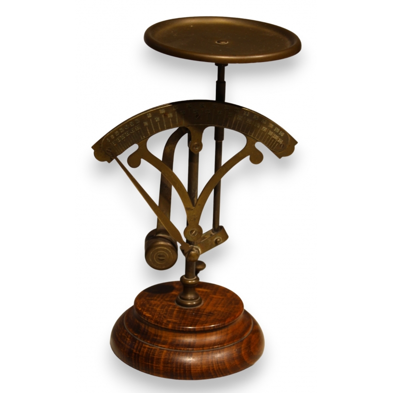 Brass letter scale, with a wooden base