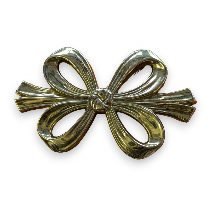 Polished brass ‘Noeud’ trivet
