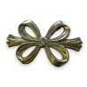 Polished brass ‘Noeud’ trivet