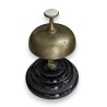 Hotel bell made of brass and black terracotta