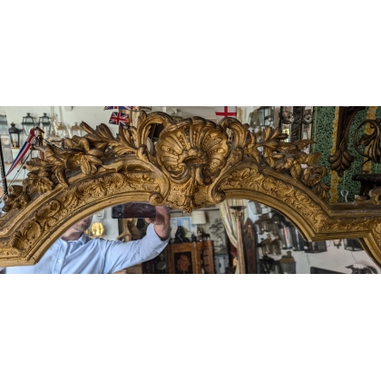 Grand miroir Napoléon III doré