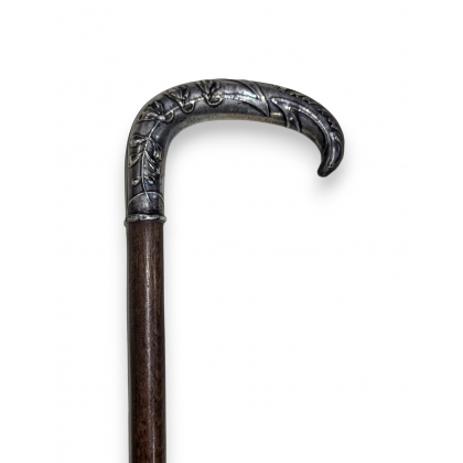 Walking stick with a silver handle