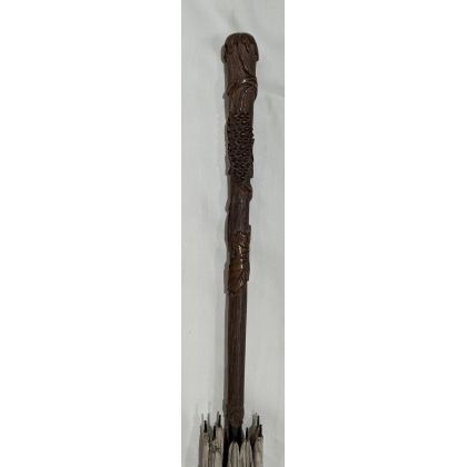 Parasol with a wooden handle carved with grapes