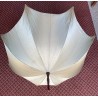 Parasol with a wooden handle carved with grapes