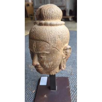 Tête de Shiva en pierre sculptée