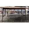  Table en fer forgé avec plateau en céramique sur  Moinat SA  - Antiquités décoration