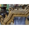 Grand miroir Napoléon III doré