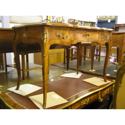 Louis XV-style rosewood desk, from  Moinat SA  - Antiques and interior design