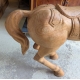 Cheval en bois sculpté brut