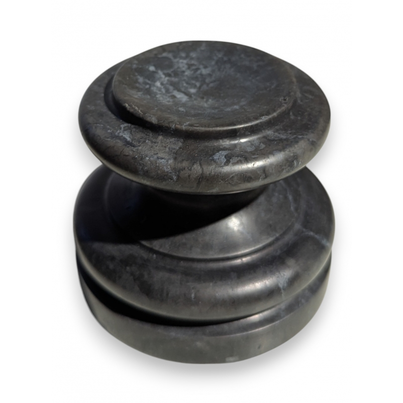 Small round black marble plinth