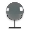 Large magnifying glass on a matt black metal stand