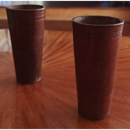 Pair of brown leather dice cups