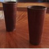 Pair of brown leather dice cups
