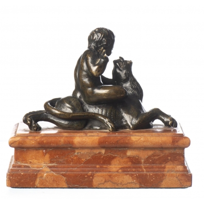 Bronze \"Putto assis sur un lion\"