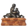 Bronze "Putto assis sur un lion"