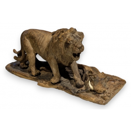 Sculpture \"Lions et phacochère\" signée B. MAKENA