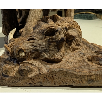 Sculpture "Lions et phacochère" signée B. MAKENA