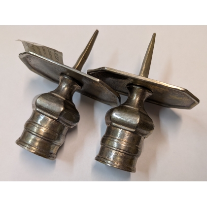 A pair of silver-plated bronze candlesticks by Tric-Trac