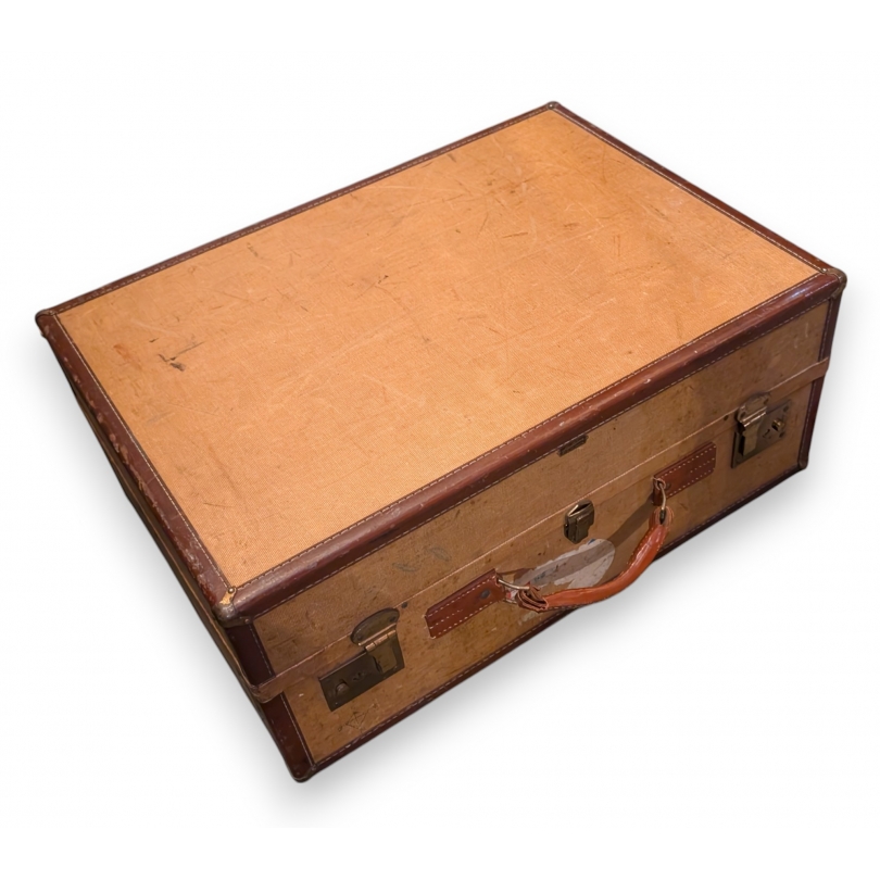 Beige fabric and brown leather suitcase