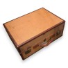 Beige fabric and brown leather suitcase