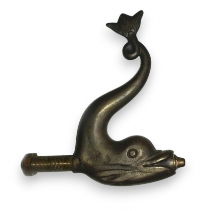 Dolphin-shaped fountain spout, weathered