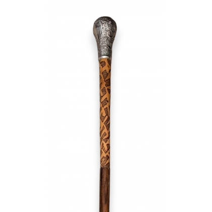 Silver-handled walking stick engraved with a heart